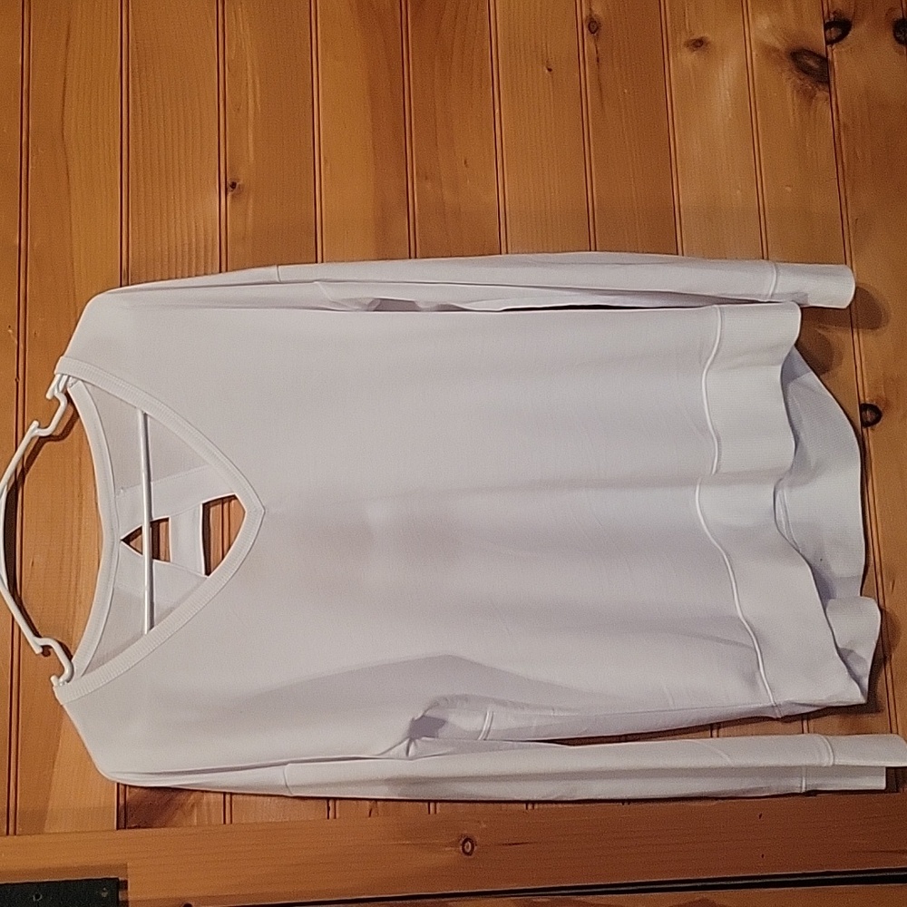 Women's lo g sleeve shirt with cutouts on back